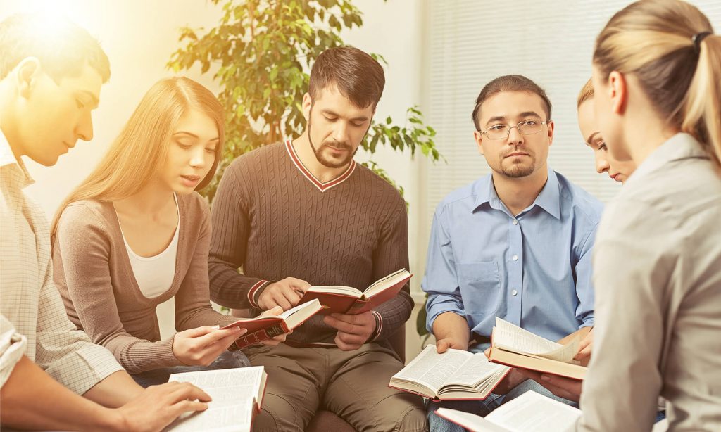 group people reading bible together