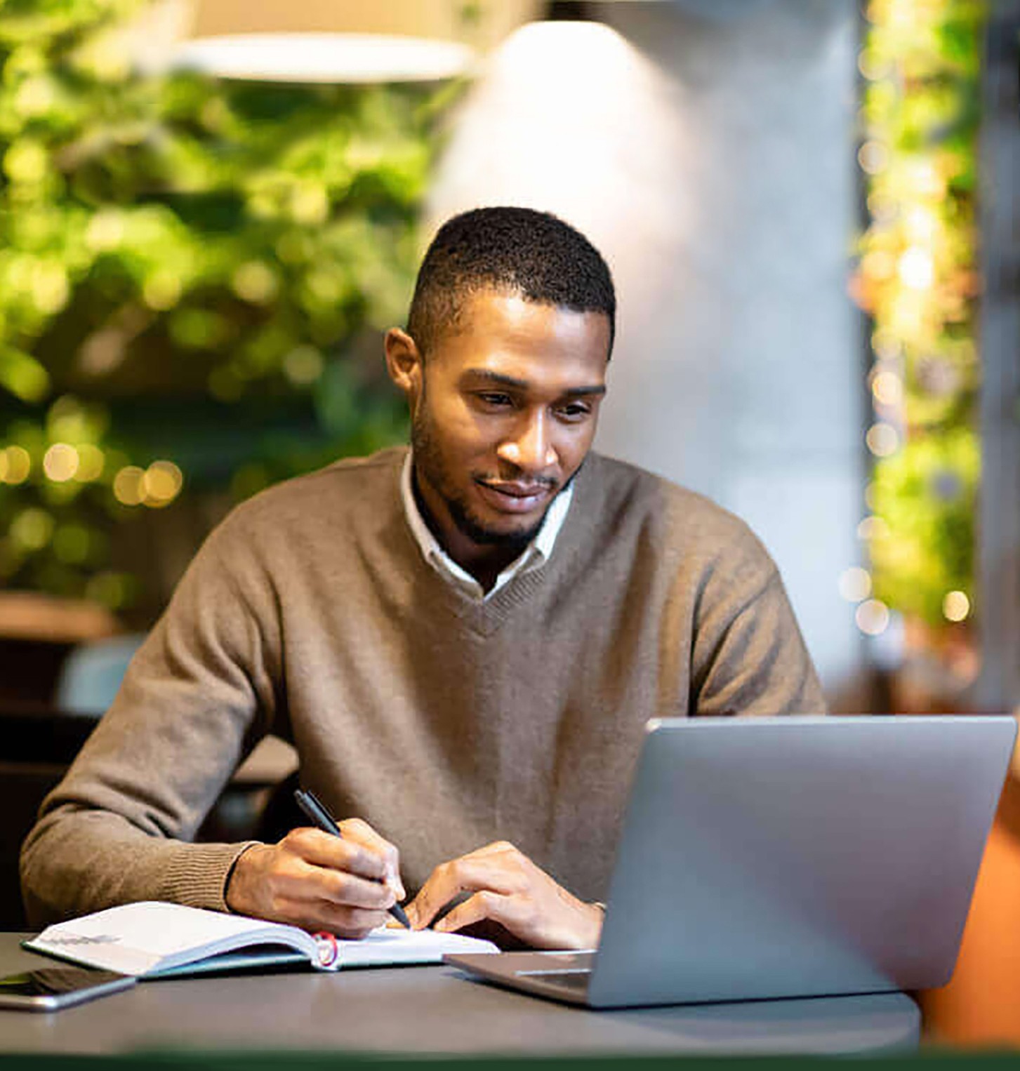 young man studying in an online bible college class