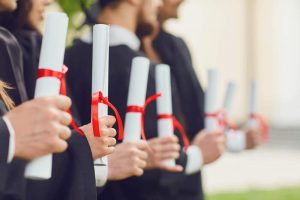 Global University _ graduates holding diplomas