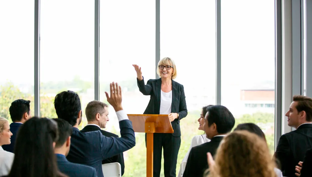 Speaker or pastor standing in front of a podium